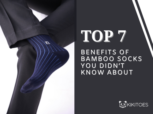 Man wearing navy blue bamboo socks with stripe design, highlighting top 7 bamboo socks benefits including breathability and anti-odour comfort by Kikitoes.