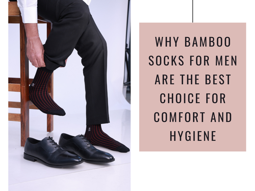 Close-up of a man wearing striped bamboo socks for men with formal shoes beside him.